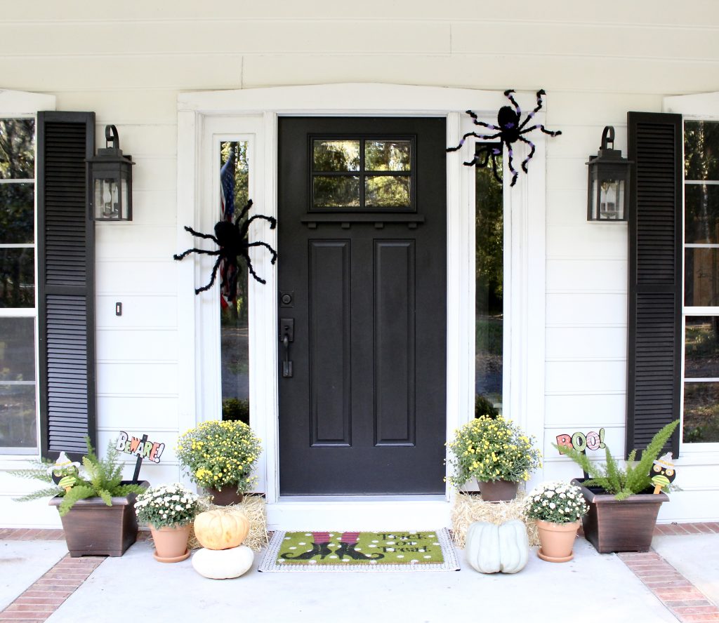 spider decorations on door