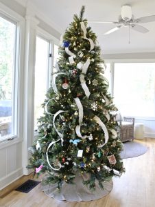 Neutral Christas Decor - artificial Christmas tree with cream cascading ribbon and burlap tree skirt | www.ourhammockhouse.com 