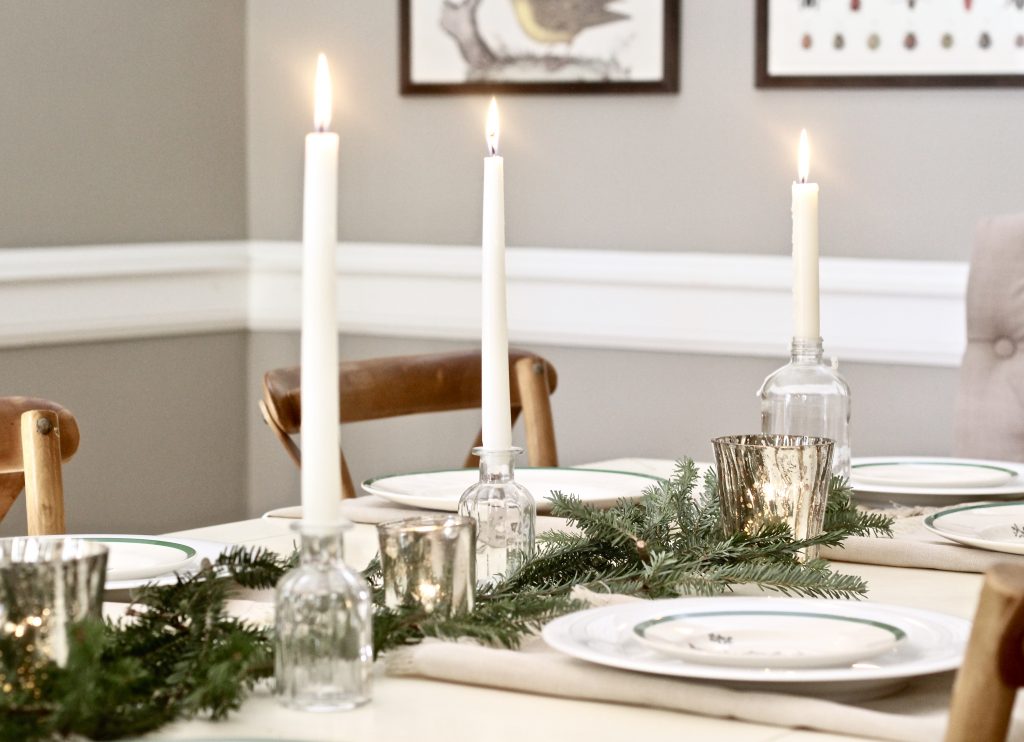 Christmas tablescape table setting with pine tree branches in center of table and mercury glass candleholders | #Christmasdecor #tablescape 