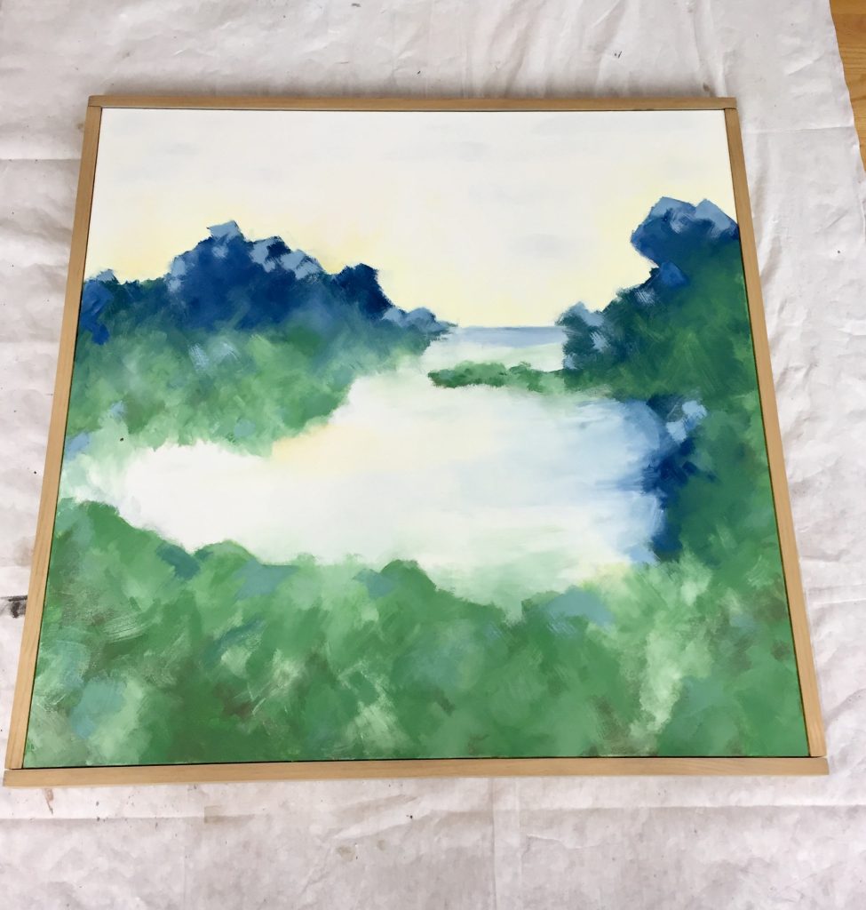 Canvas with wood attached on all sides to create frame 