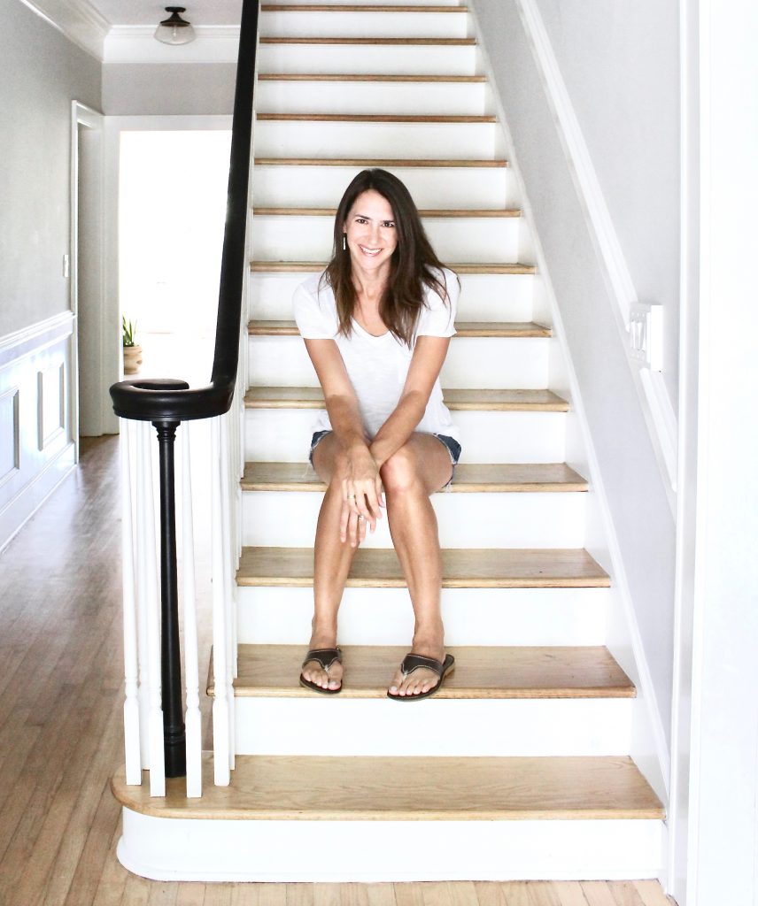 Author of blog sitting on stairway