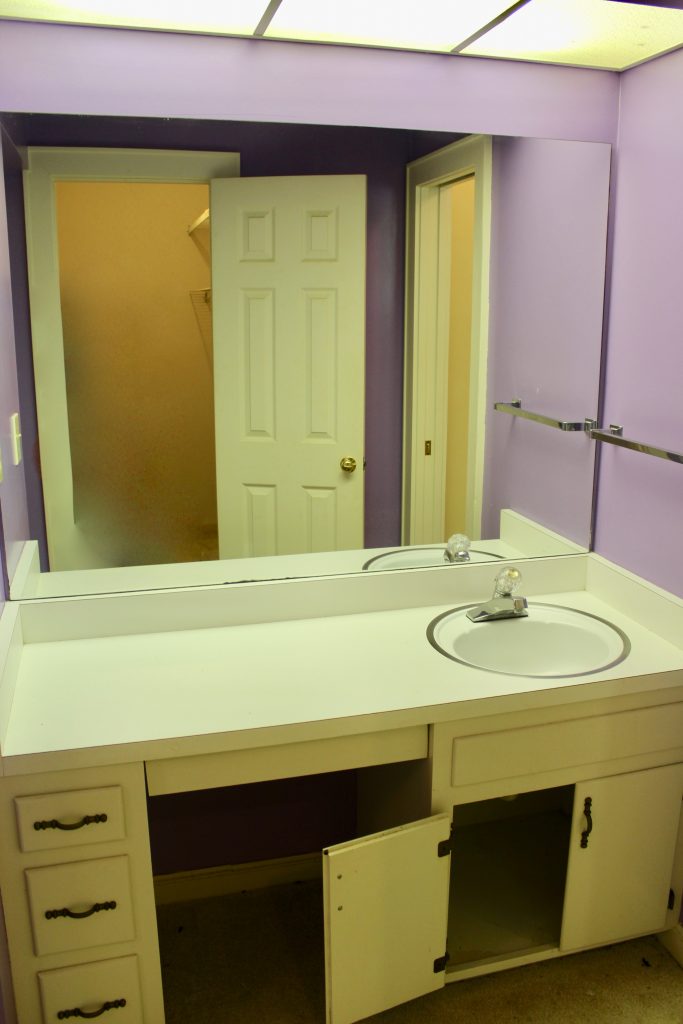Jack-and-Jill Bathroom Before with bright purple walls