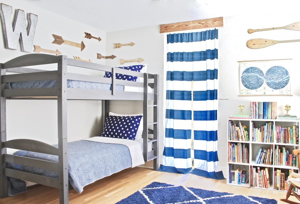 Boys adventure theme bedroom with gray bunk beds, natural wood accents, and chambray and navy bedding | www.ourhammockhouse.com | #boysbedroom #kids room #bunkbeds