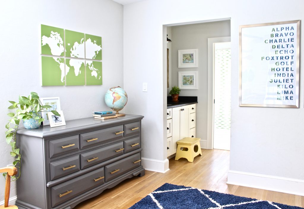 Boys adventure theme bedroom with gray dresser and map artwork and engineering prints | www.ourhammockhouse.com | #boysbedroom #kidsroom #graydresser
